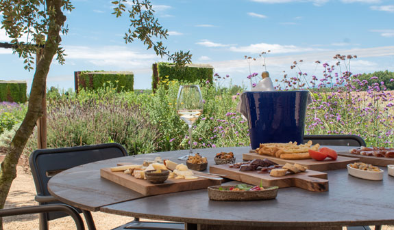 An outdoor table with snacks