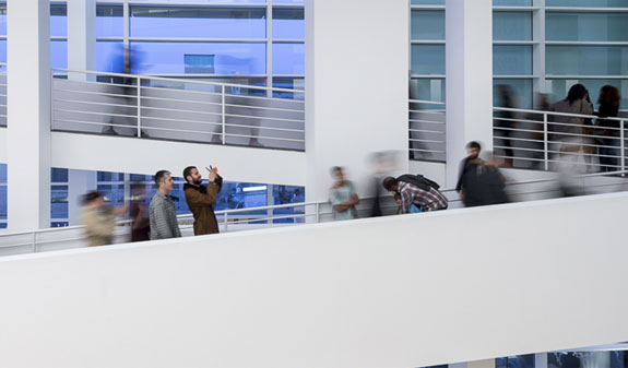 Two people appear taking a selfie inside MACBA Museum in Barcelona