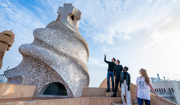 Visitors in front of the chimney of La Pedrera
